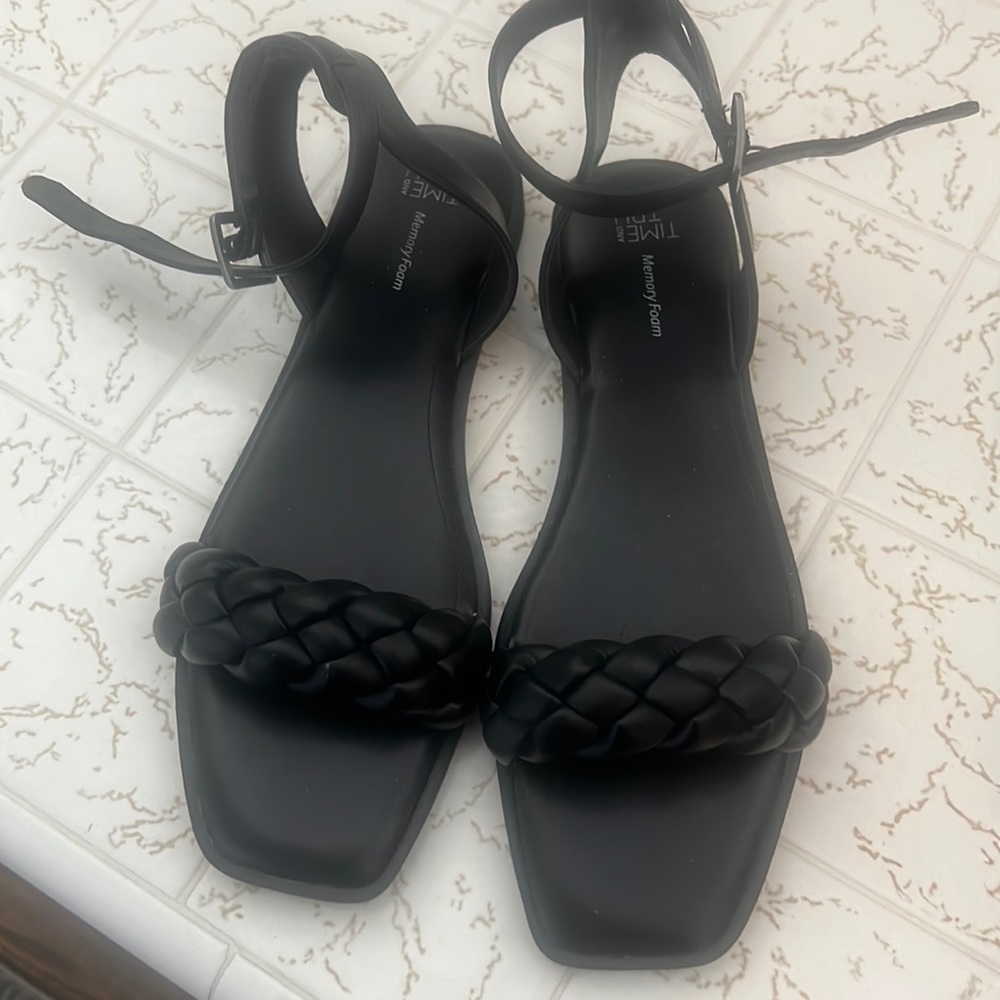 Size 9 new flat sandal. Never worn